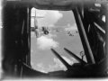 
A formation of Martin Baltimores of No. 232 Wing RAF flying to attack enemy positions during the Battle of El Alamein, seen through the lower gun hatch of another aircraft.

CM 3848
Part of
AIR MINISTRY SECOND WORLD WAR OFFICIAL COLLECTION

Royal Air Force official photographer